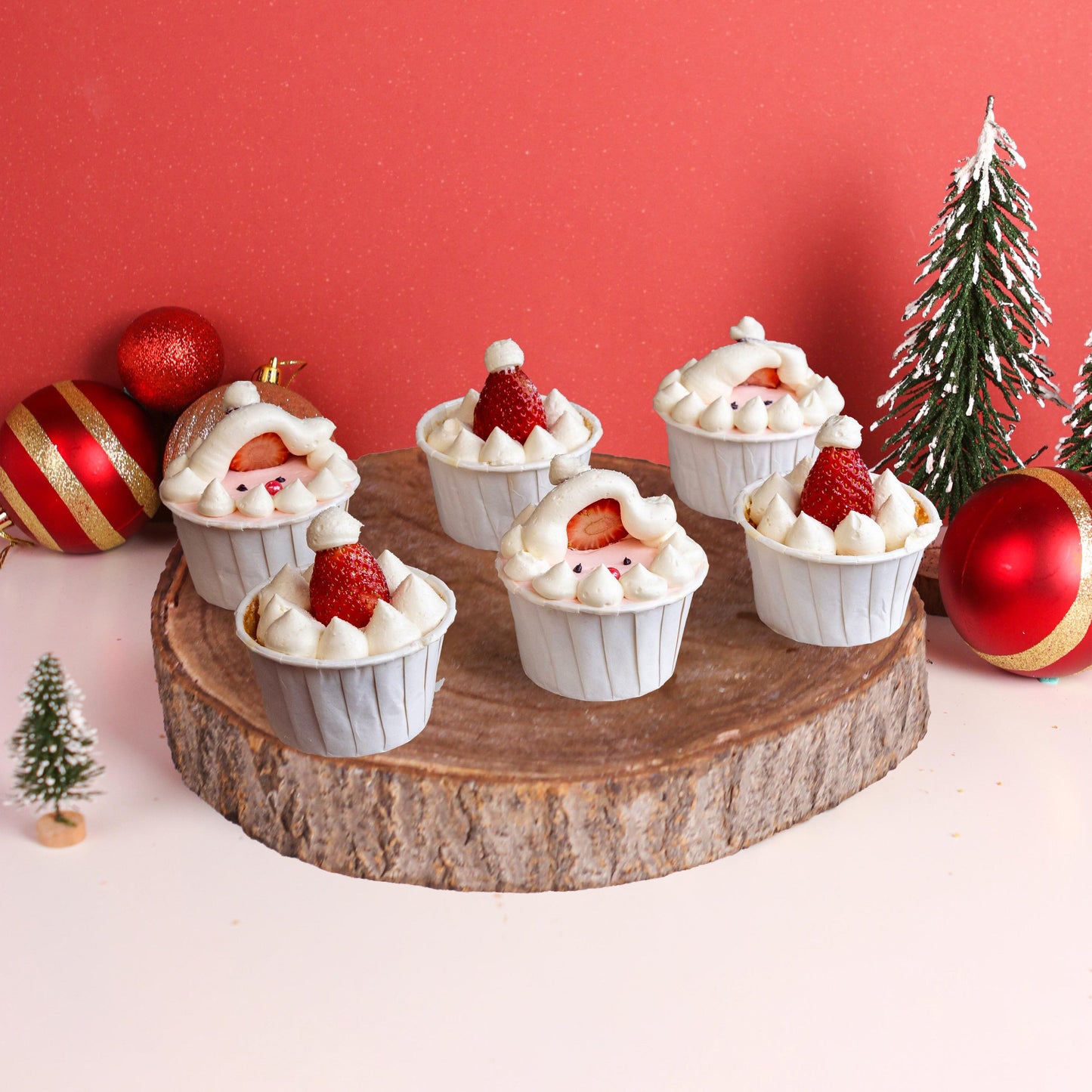 12 pieces of Strawberry Santa Christmas Cupcakes