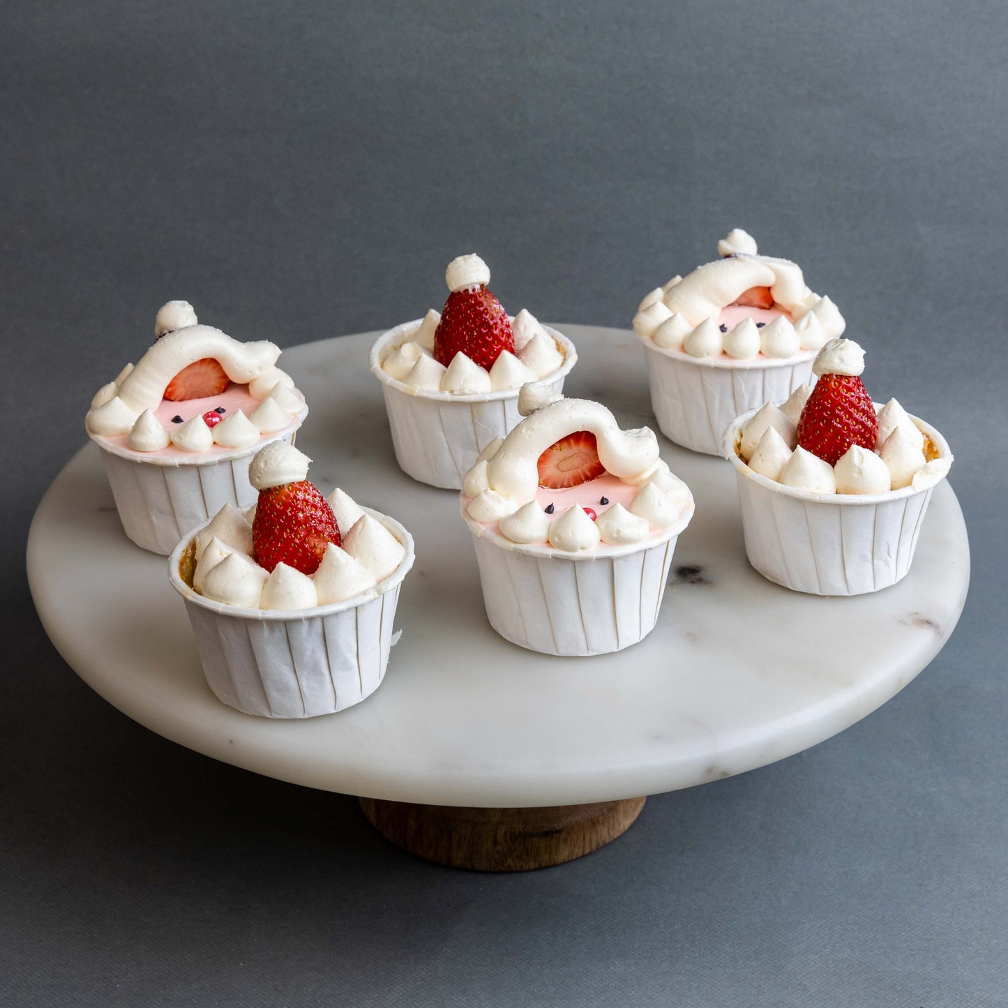 12 pieces of Strawberry Santa Christmas Cupcakes