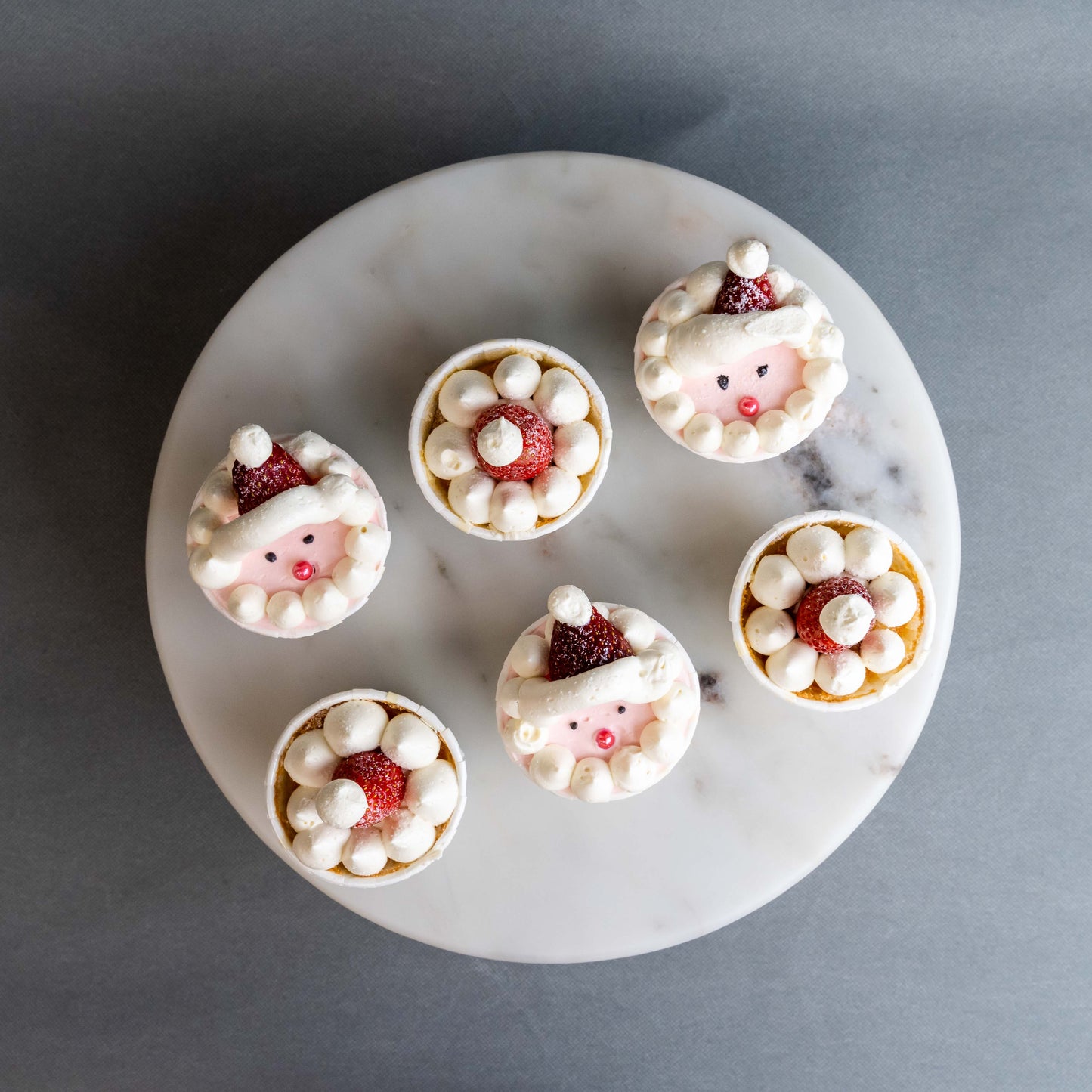 12 pieces of Strawberry Santa Christmas Cupcakes