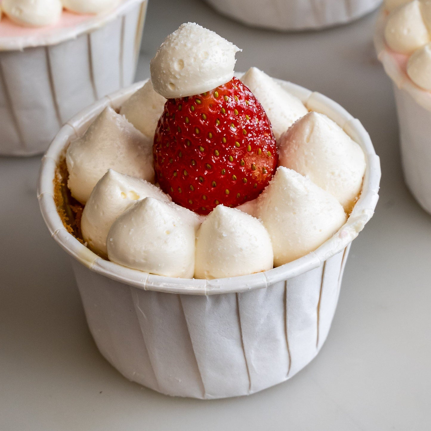 12 pieces of Strawberry Santa Christmas Cupcakes